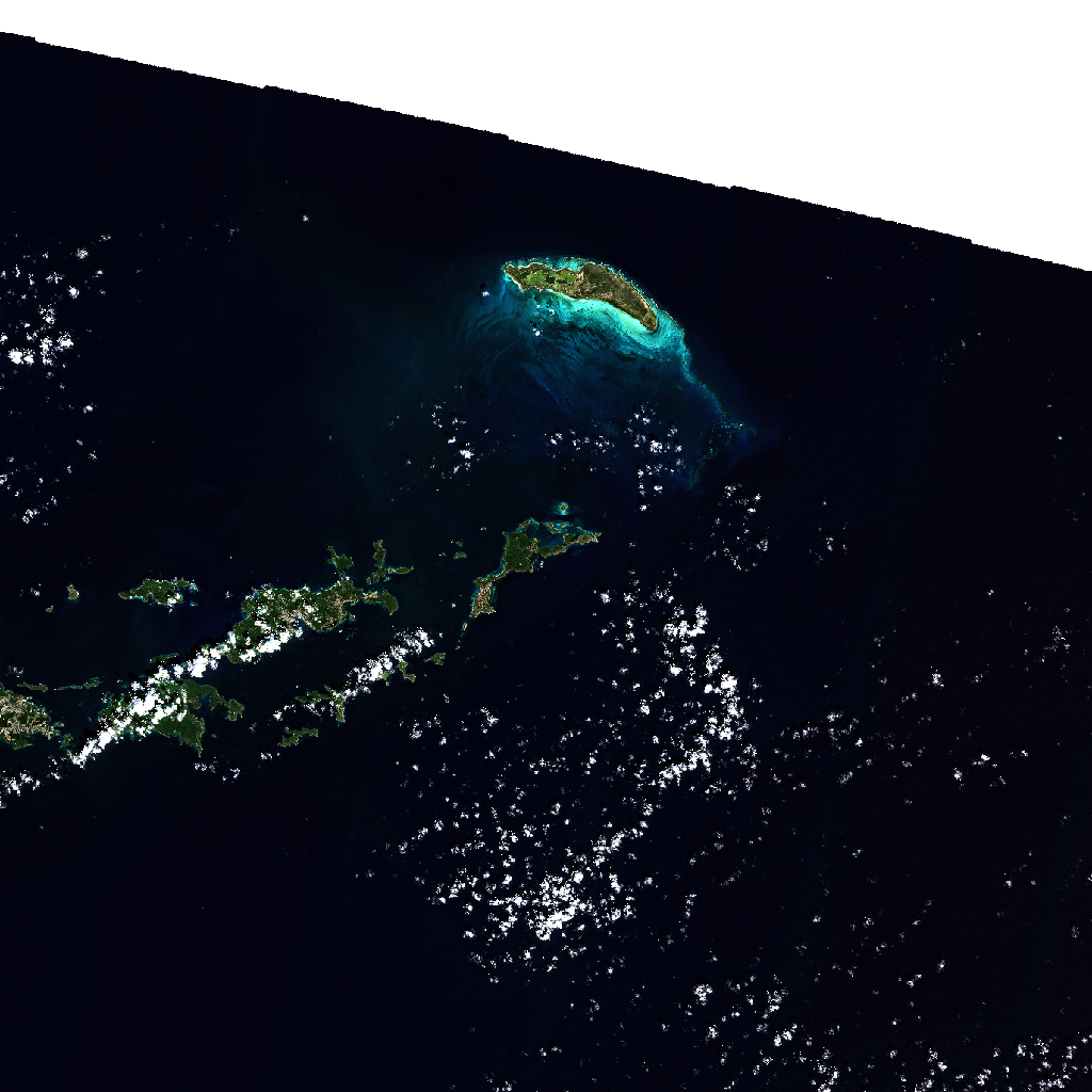 True-color satellite image of the British Virgin Islands, showing the turquoise shallow-water banks and island chain against deep ocean.